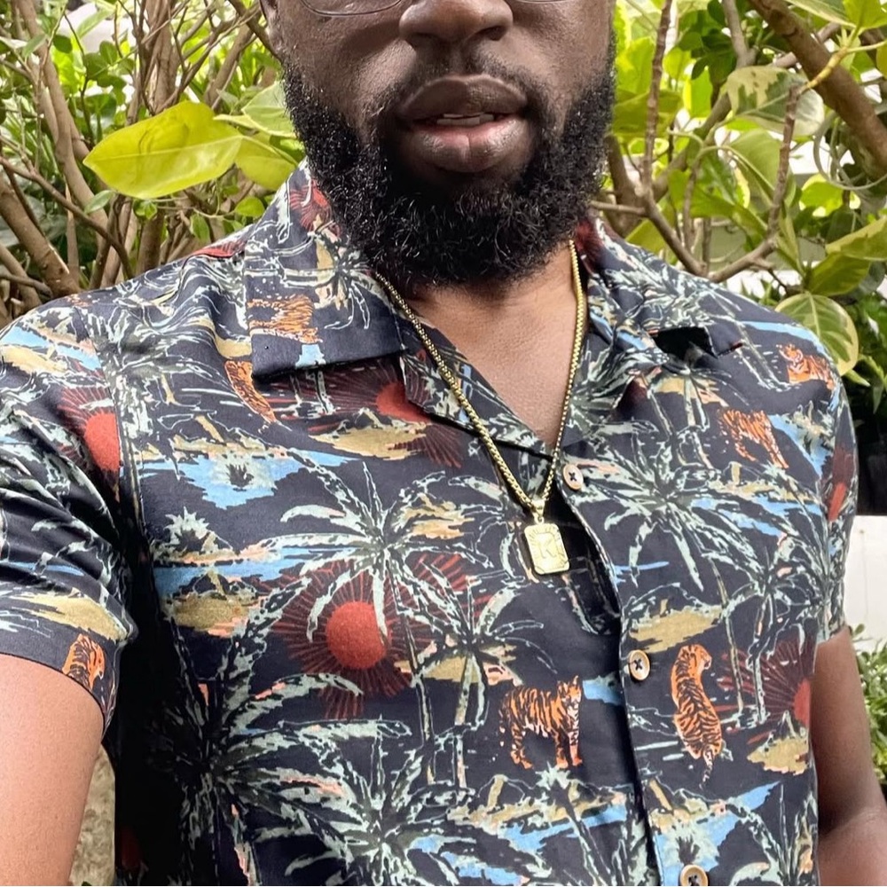 MBX Premium Goods floral resort wear button down shirt.